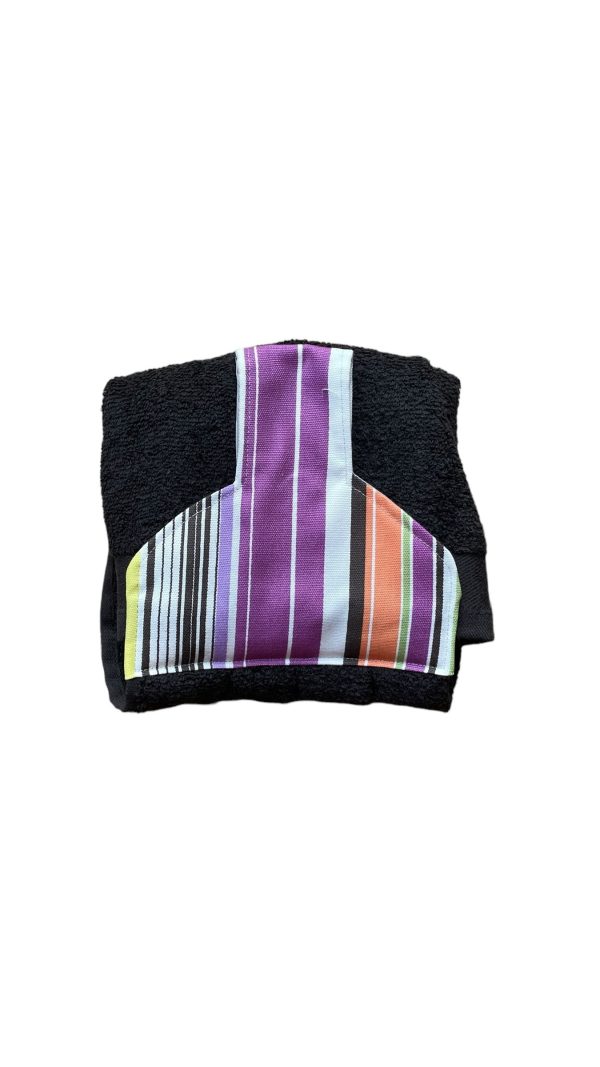 Hand towel to hang on a kitchen or Aga rail. Fastened with magnetic popper. Towel black. Top stipes of purple/orange/white/green/yellow.